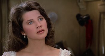 Movie still from “Spaceballs” (1987), directed by Mel Brooks – A person with blue eyes; Close Up shot, Over the shoulder angle