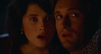 Movie still from “Spaceballs” (1987), directed by Mel Brooks – A man and a woman staring at the camera; Close Up shot, Low angle