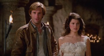 Movie still from “Spaceballs” (1987), directed by Mel Brooks – A man and a woman standing next to each other; Close Up shot, Low angle