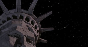 Movie still from “Spaceballs” (1987), directed by Mel Brooks – The statue of liberty is seen against the night sky; Extreme Wide shot, Low angle