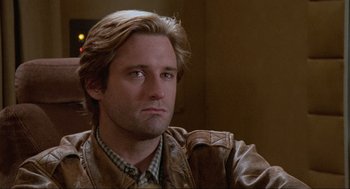 Movie still from “Spaceballs” (1987), directed by Mel Brooks – A person wearing a leather jacket; Close Up shot, Low angle