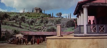 Movie still from “Spartacus” (1960), directed by Stanley Kubrick – A group of people standing on top of a hill; Extreme Wide shot, Low angle
