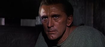 Movie still from “Spartacus” (1960), directed by Stanley Kubrick – A person wearing a sweater; Close Up shot, High angle