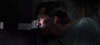 Movie still from “Spartacus” (1960), directed by Stanley Kubrick – A person looking to the side; Close Up shot, Low angle