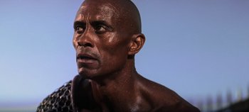 Movie still from “Spartacus” (1960), directed by Stanley Kubrick – A man's face with a chain around his neck; Close Up shot, Low angle