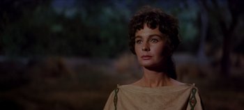 Movie still from “Spartacus” (1960), directed by Stanley Kubrick – A person wearing a dress; Close Up shot, Low angle