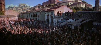 Movie still from “Spartacus” (1960), directed by Stanley Kubrick – A crowd of people standing in front of a building; Extreme Wide shot, High angle
