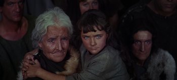 Movie still from “Spartacus” (1960), directed by Stanley Kubrick – An old woman and a young girl with blue eyes; Close Up shot, High angle