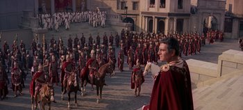 Movie still from “Spartacus” (1960), directed by Stanley Kubrick – A large group of men in roman garb on horses; Extreme Wide shot, High angle