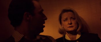 Movie still from “Speed” (1994), directed by Jan de Bont – A man and a woman looking at each other; Close Up shot, Over the shoulder angle