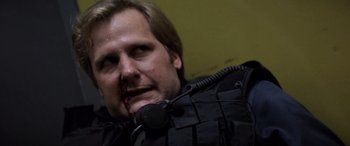 Movie still from “Speed” (1994), directed by Jan de Bont – A person wearing a jacket; Close Up shot, Low angle