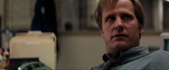 Movie still from “Speed” (1994), directed by Jan de Bont – A person wearing a neck tie; Close Up shot, Low angle