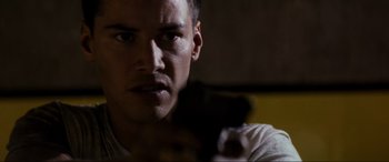 Movie still from “Speed” (1994), directed by Jan de Bont – A man's face in the dark; Close Up shot, Low angle