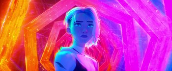 Movie still from “Spider-Man: Across the Spider-Verse” (2023), directed by Joaquim Dos Santos – A woman with short blonde hair standing in front of an abstract background; Close Up shot, Over the shoulder angle