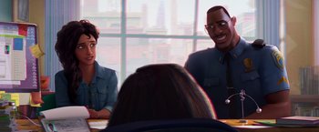 Movie still from “Spider-Man: Across the Spider-Verse” (2023), directed by Joaquim Dos Santos – A man and a woman sitting in front of another man in front of a window; Medium shot, Over the shoulder angle