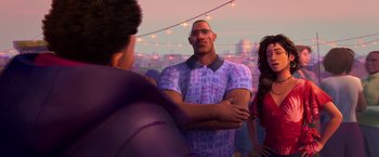 Movie still from “Spider-Man: Across the Spider-Verse” (2023), directed by Joaquim Dos Santos – A man with a big muscular chest standing in front of a crowd of onlookers; Medium shot, Over the shoulder angle