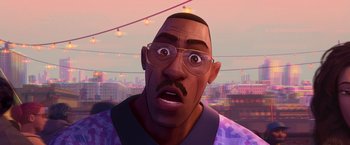 Movie still from “Spider-Man: Across the Spider-Verse” (2023), directed by Joaquim Dos Santos – An illustration of a man with a surprised look on his face; Close Up shot, Low angle