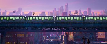 Movie still from “Spider-Man: Across the Spider-Verse” (2023), directed by Joaquim Dos Santos – A man standing on top of a train bridge; Extreme Wide shot, Low angle