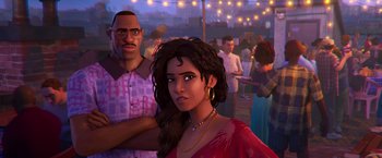 Movie still from “Spider-Man: Across the Spider-Verse” (2023), directed by Joaquim Dos Santos – A woman in a red dress is standing next to a man in glasses; Medium shot, Over the shoulder angle