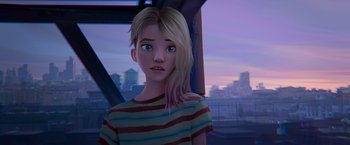 Movie still from “Spider-Man: Across the Spider-Verse” (2023), directed by Joaquim Dos Santos – A girl with blonde hair and a striped t - shirt; Close Up shot, Over the shoulder angle