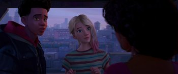 Movie still from “Spider-Man: Across the Spider-Verse” (2023), directed by Joaquim Dos Santos – A girl with blonde hair is looking out a window at a city; Medium shot, Over the shoulder angle