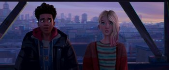 Movie still from “Spider-Man: Across the Spider-Verse” (2023), directed by Joaquim Dos Santos – A man and a woman standing next to each other in front of a city; Close Up shot, Over the shoulder angle