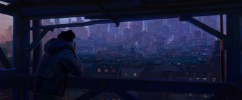 Movie still from “Spider-Man: Across the Spider-Verse” (2023), directed by Joaquim Dos Santos – A person looking out a window at a city at night; Extreme Wide shot, Low angle