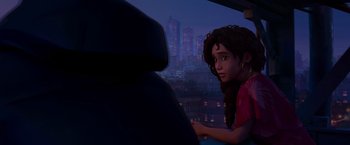Movie still from “Spider-Man: Across the Spider-Verse” (2023), directed by Joaquim Dos Santos – A woman sitting in a car looking out a window; Medium shot, Over the shoulder angle