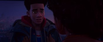 Movie still from “Spider-Man: Across the Spider-Verse” (2023), directed by Joaquim Dos Santos – A man and a woman talking to each other; Close Up shot, Over the shoulder angle
