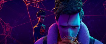 Movie still from “Spider-Man: Across the Spider-Verse” (2023), directed by Joaquim Dos Santos – A spider - man and a man in a purple outfit; Close Up shot, Over the shoulder angle