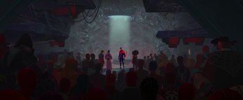 Movie still from “Spider-Man: Across the Spider-Verse” (2023), directed by Joaquim Dos Santos – A group of people standing in front of an audience; Extreme Wide shot, Over the shoulder angle