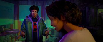 Movie still from “Spider-Man: Across the Spider-Verse” (2023), directed by Joaquim Dos Santos – A man and a woman are looking at each other; Medium shot, Over the shoulder angle