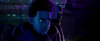 Movie still from “Spider-Man: Across the Spider-Verse” (2023), directed by Joaquim Dos Santos – Two people are standing next to each other in the dark; Close Up shot, Over the shoulder angle