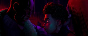 Movie still from “Spider-Man: Across the Spider-Verse” (2023), directed by Joaquim Dos Santos – A man and a woman staring at each other; Close Up shot, Over the shoulder angle