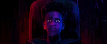 Movie still from “Spider-Man: Across the Spider-Verse” (2023), directed by Joaquim Dos Santos – A young man with a strange look on his face; Close Up shot, Overhead angle