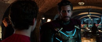 Movie still from “Spider-Man: Far from Home” (2019), directed by Jon Watts – Jake gyllenhaal as mysterio in spider - man : far from home; Medium shot, Over the shoulder angle