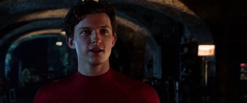 Movie still from “Spider-Man: Far from Home” (2019), directed by Jon Watts – A person wearing a spider man costume; Close Up shot, Over the shoulder angle