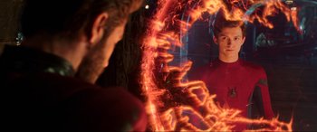 Movie still from “Spider-Man: Far from Home” (2019), directed by Jon Watts – A man looking at himself in the mirror; Medium shot, Over the shoulder angle