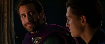 Movie still from “Spider-Man: Far from Home” (2019), directed by Jon Watts – A man in a purple jacket and a man in a red jacket; Close Up shot, Over the shoulder angle