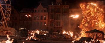 Movie still from “Spider-Man: Far from Home” (2019), directed by Jon Watts – A large pile of trash burning in the middle of the night; Extreme Wide shot, High angle