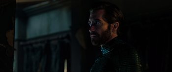 Movie still from “Spider-Man: Far from Home” (2019), directed by Jon Watts – A person with a beard; Close Up shot, Over the shoulder angle
