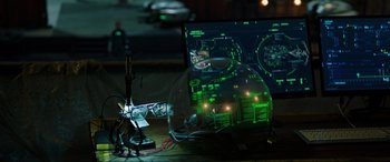 Movie still from “Spider-Man: Far from Home” (2019), directed by Jon Watts – A computer screen with a glass case on top of it; Extreme Close Up shot, High angle