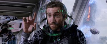 Movie still from “Spider-Man: Far from Home” (2019), directed by Jon Watts – A man wearing a space suit and a helmet; Close Up shot, Over the shoulder angle