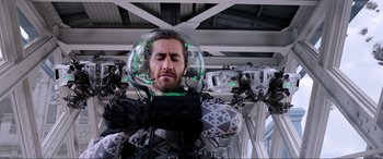 Movie still from “Spider-Man: Far from Home” (2019), directed by Jon Watts – A man in a spacesuit is holding a helmet; Medium shot, Low angle