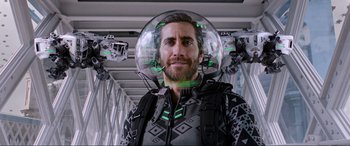 Movie still from “Spider-Man: Far from Home” (2019), directed by Jon Watts – A man with a helmet on his head; Medium shot, Over the shoulder angle