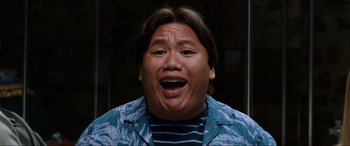 Movie still from “Spider-Man: Far from Home” (2019), directed by Jon Watts – A man with a surprised expression on his face; Close Up shot, Low angle