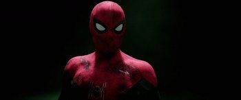 Movie still from “Spider-Man: Far from Home” (2019), directed by Jon Watts – A spider - man's face in the dark; Close Up shot, Low angle