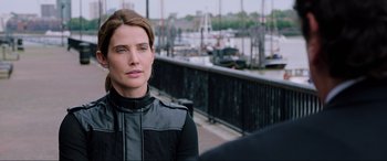 Movie still from “Spider-Man: Far from Home” (2019), directed by Jon Watts – A woman in black jacket standing next to a pier; Close Up shot, Over the shoulder angle