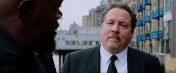 Movie still from “Spider-Man: Far from Home” (2019), directed by Jon Watts – A person wearing a suit and a tie; Close Up shot, Over the shoulder angle