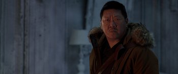 Movie still from “Spider-Man: No Way Home” (2021), directed by Jon Watts – A person wearing a coat; Close Up shot, Over the shoulder angle